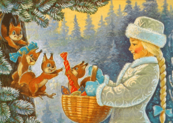 Снегрочка в зимнем лесу дарит белкам конфеты