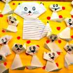 Кошка с котятами, выполненные из бумаги и наклеенные на лист картона