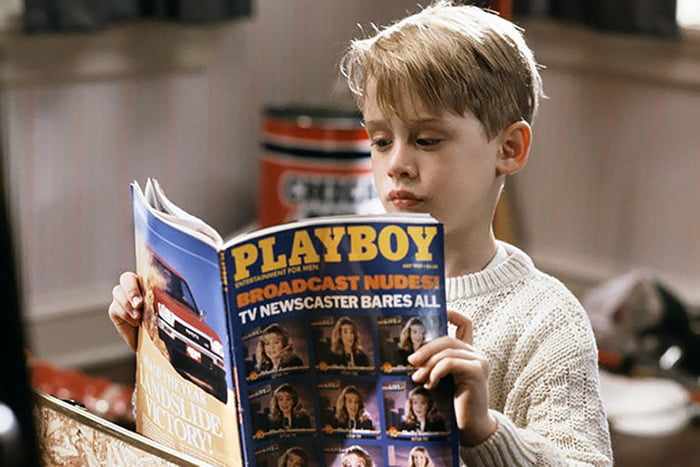 Мальчик читает Playboy